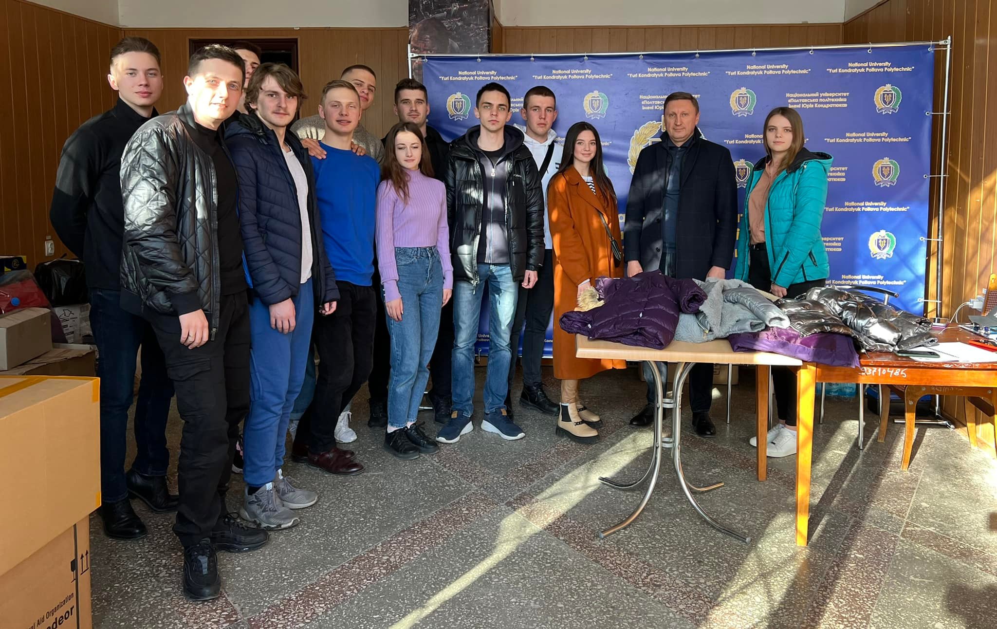 Rector hands over warm clothes for displaced persons to the volunteer headquarters