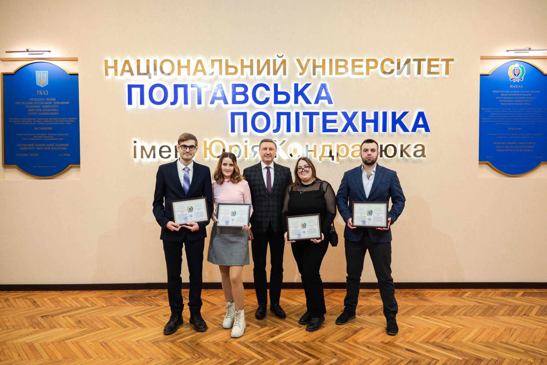 Four graduates of the Polytechnic's postgraduate program receive Doctor of Philosophy degrees